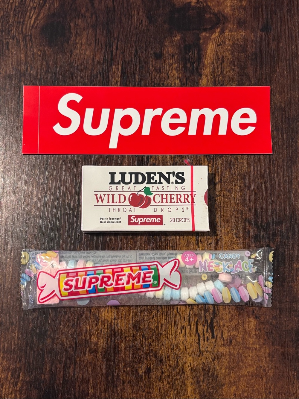 Supreme Smarties Candy Necklace SS22 + Supreme Luden’s SS18 + Redbox Logo NY
